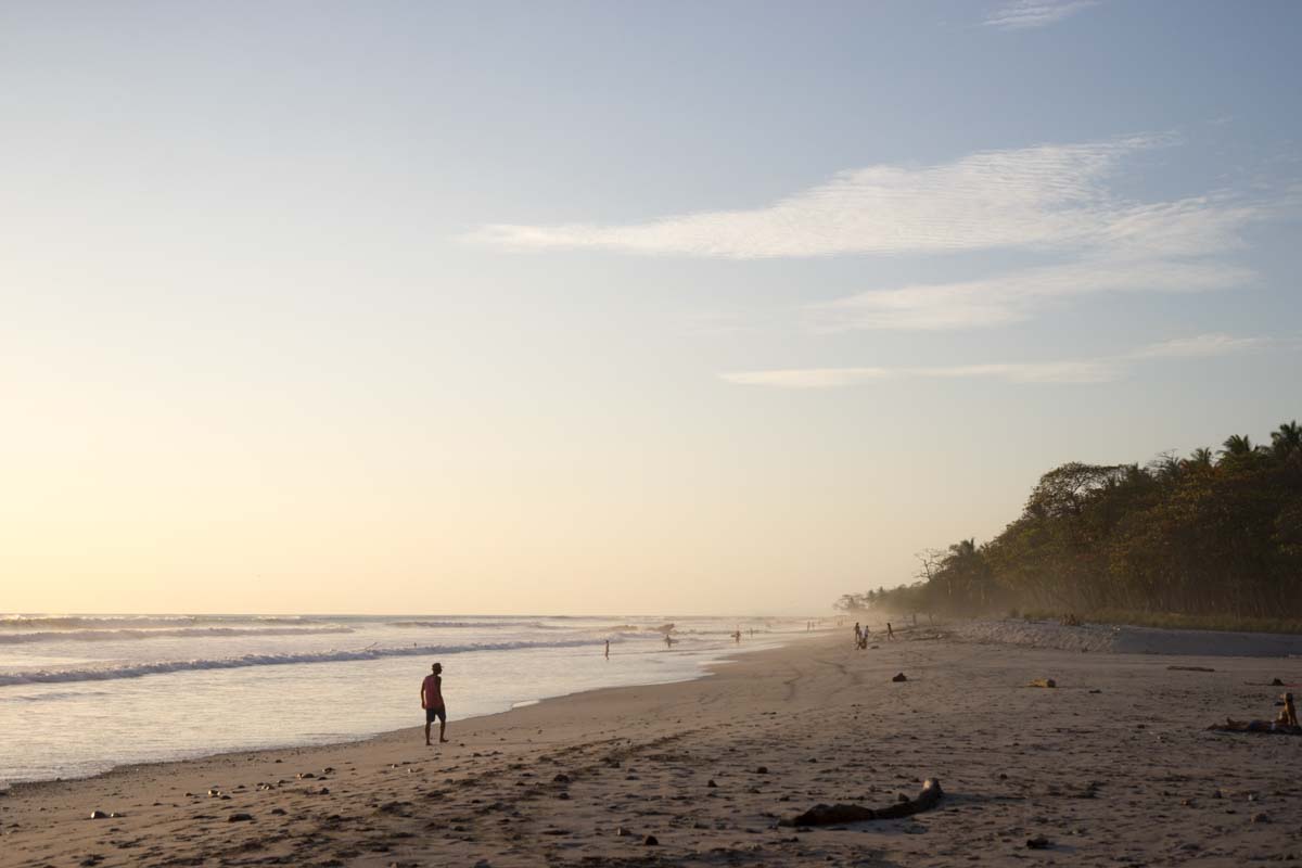 Photo of the sea and sky on the horizon with the foundations of a demolished house.